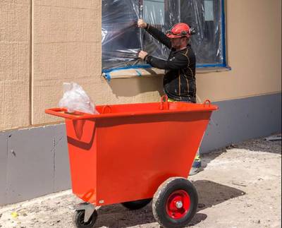 Steel waste trolley with lifting arms, solid rubber